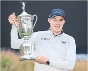  ?? AFP ?? Matt Fitzpatric­k of England poses with the US Open trophy at The Country Club in Brookline on Sunday.