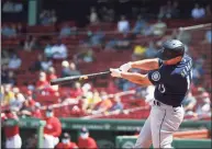  ?? Kathryn Riley / Getty Images ?? The Mariners’ Kyle Seager hits a two-run double in the second inning against the Red Sox at Fenway Park on Saturday.