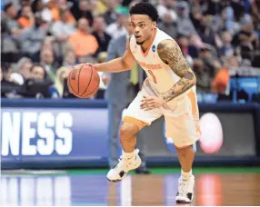  ??  ?? Tennessee guard Lamonte Turner drives down the court during the NCAA Tournament first round game against Wright State. BRIANNA PACIORKA/NEWS SENTINEL