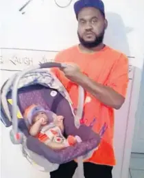 ?? COURTESY OF FAMILY ?? Primes “PJ” Rucker holds his son, who now is 5. Rucker, 34, was shot to death in July at his mother’s Pine Hills apartment.