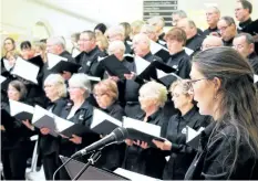  ?? ALLAN BENNER/TRIBUNE STAFF ?? Members of Chorus Niagara perform during the choir's annual singathon at Seaway Mall in Welland.