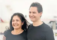  ?? FRANK GUNN THE CANADIAN PRESS FILE PHOTO ?? Michael Kovrig embraces his wife, Vina Nadjibulla, after arriving at Pearson Internatio­nal Airport from China last month.