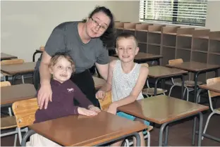  ?? ?? Clarice and Daniel Webb with mum Daniel Britz in the Grade One classroom of MLA.