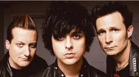  ?? Bruce Gilbert / Associated Press ?? Green Day (from left, Tre Cool, Billie Joe Armstrong and Mike Dirnt) was arguably the last rock band to turn fury into a top 10 album.