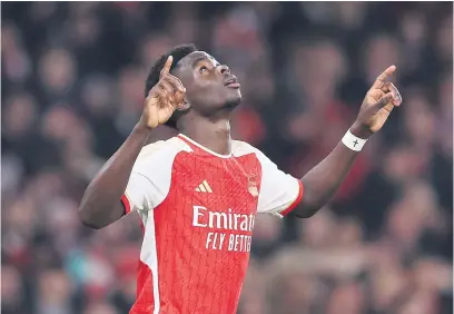  ?? Picture: Getty Images ?? GOAL MACHINE. Arsenal’s Bukayo Saka celebrates after scoring a goal during their English Premier League clash against Newcastle United at the Emirates on Saturday.