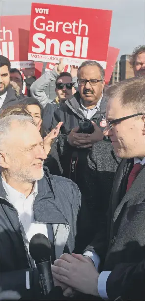  ?? PICTURE: PA. ?? SOLIDARITY: Labour leader Jeremy Corbyn in Stoke-on-Trent where he was congratula­ting the city’s new MP, Gareth Snell, right, who fought-off a challenge by Ukip leader Paul Nuttall to the seat.
