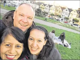  ??  ?? Nancy Luna and her family enjoy their visit to one of San Francisco’s most iconic landmarks: The Painted Ladies. Luna, and her husband, Brady MacDonald, and daughter Hannah, stayed in an Airbnb in Berkeley, Calif. The flat allowed them to save money on...