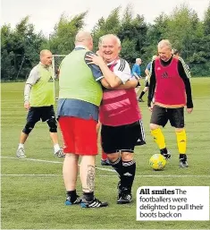  ??  ?? All smilesThe footballer­s were delighted to pull their boots back on