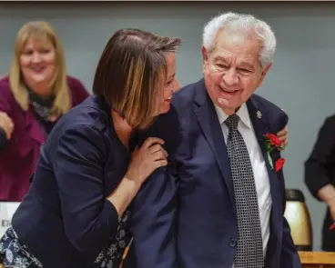  ?? GABRIELA CAMPOS/THE NEW MEXICAN ?? From left, Rep. Stephanie Garcia Richard, D-Los Alamos, embraces Rep. Nick Salazar, D-Ohkay Owingeh, as the session comes to an end Thursday. This was Salazar’s 46th and final year in the House.