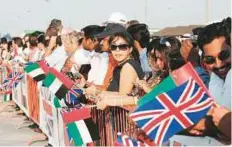  ?? Virendra Saklani/Gulf News Archives ?? ■ Crowds greet the arrival of the QE2 at Port Rashid, ending its journey as a cruise liner to take on a new role in Dubai.