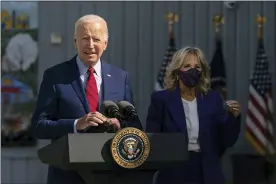  ?? MANUEL BALCE CENETA — THE ASSOCIATED PRESS ?? President Joe Biden, with first lady Jill Biden, speaks during a visit at Brookland Middle School in northeast Washington, Friday, Sept. 10, 2021. Biden has encouraged every school district to promote vaccines, including with on-site clinics, to protect students as they return to school amid a resurgence of the coronaviru­s.