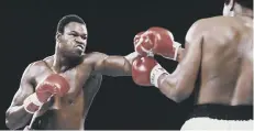  ??  ?? Larry Holmes on his way to beating Muhammad Ali.