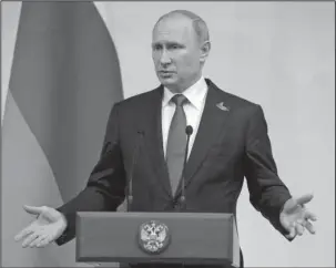  ?? The Associated Press ?? PUTIN: Russian President Vladimir Putin gestures during a press conference Saturday after the G-20 summit in Hamburg, northern Germany, where the leaders of the group of 20 met for two days.