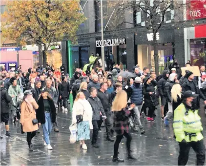  ??  ?? Anti-lockdown protesters marching through Liverpool city centre on Saturday, November 21. Some were arrested by Merseyside Police who had a dispersal zone in place