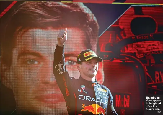  ?? REX ?? Thumbs up: Verstappen is delighted after his Monza win