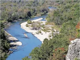  ?? [TULSA ?? The Illinois River flows through the landscape near Tahlequah in October 2015.