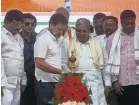  ?? PHOTOGRAPH: MANISH SWARUP/AP ?? Campaigner­s with Narendra Modi in Uttar Pradesh. Above, Rahul Gandhi, centre, at a rally in Mandya