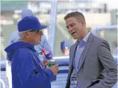  ?? AP ?? Epstein chats with then-manager Joe Maddon before a playoff game against the Cardinals in 2015.