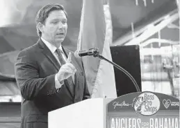  ?? JOE CAVARETTA/SOUTH FLORIDA SUN SENTINEL ?? Gov. Ron DeSantis helped launch “Anglers for the Bahamas” on Thursday at the Bass Pro Shops in Dania Beach. DeSantis later said he didn’t have a problem with the Trump administra­tion decision not to grant Temporary Protected Status to allow Bahamians to live and work in the U.S. while their country recovers from Hurricane Dorian.