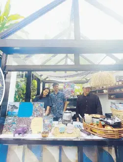  ?? ?? The glass house that IG made famous serves up Robusta from Leon, Iloilo, with its team of baristas Lauren Sauler, Jet del Rosario and Elijah Ng.