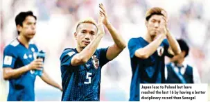  ??  ?? Japan lose to Poland but have reached the last 16 by having a better disciplina­ry record than Senegal