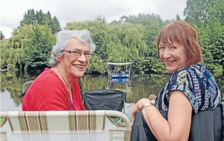  ?? PHOTO: TERESA HATTAN ?? Joan Reed and Vera Farmilo having fun at last year’s Concert by the Lake.