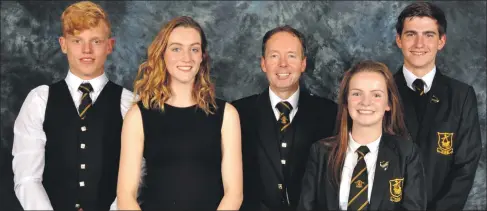  ??  ?? Head teacher Peter Bain, centre, is joined by prize winners Stephen Povey and Emma Thompson, and head girl Selina Keppie and head boy James MacIntyre.