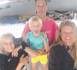  ??  ?? Louise and Lachin Turner with their children, Siara, 11, and Kai, 4, aboard the catamaran and (below) one of the pirate skiffs and the Pakistani warship that came to their aid off Yemen.