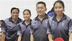  ??  ?? From left: Harvi Yee with her daughters Grace, Sally Yee (right) and Anthony Ho (head coach) at the Korman Stadium in Port Vila, Vanuatu, on December 4, 2017.