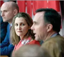  ?? The Canadian Press ?? Deputy Prime Minister Chrystia Freeland listens to Minister of Finance Bill Morneau as he speaks at a press conference on COVID-19 at West Block on Parliament Hill in Ottawa, on Wednesday.