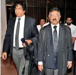  ??  ?? Solicitor General Dappula de Livera (left) and Attorney General Jayantha Jayasuriya (centre) arriving in court on Friday