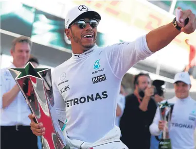  ?? Picture: Getty Images. ?? Britain’s Lewis Hamilton celebrates victory in the Italian Grand Prix at Monza.