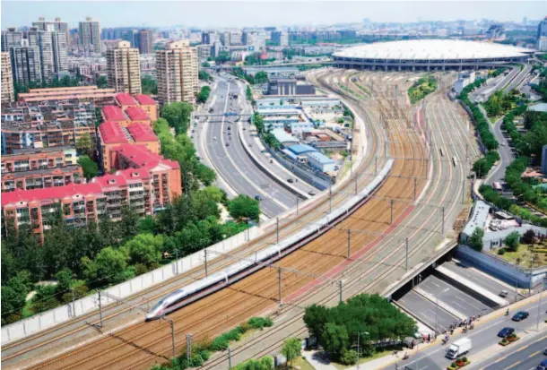  ??  ?? June 26, 2017: A Fuxing train sets off from Beijing South Railway Station, the north terminal of the Beijing-shanghai High-speed Railway.