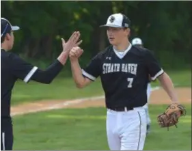  ?? PETE BANNAN — MEDIANEWS GROUP ?? Strath Haven sophomore Koll Peichel, being congratula­ted in a game against Penncrest last week, pitched 6.1 innings and laid down a key sacrifice bunt in Tuesday’s dramatic win over Harriton.