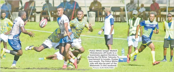  ?? Picture: ELIKI NUKUTABU ?? Police White winger Maikeli Rokodunono off-loads to a teammate against Korolevu during the Fiji Bitter Yalovata 7s tournament in Levuka, Ovalau last month. The Police White side will also be part of the Malomalo 7s this weekend.
