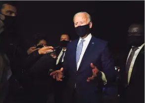  ?? Carolyn Kaster / Associated Press ?? Joe Biden speaks to reporters at Wilkes-Barre Scranton Internatio­nal Airport in Avoca, Pa., on Thursday.