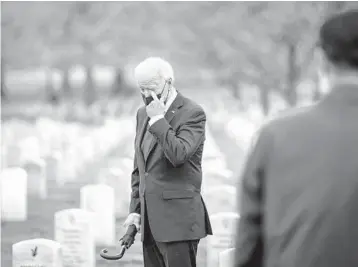  ?? DOUG MILLS/THE NEW YORK TIMES ?? President Biden visited Arlington National Cemetery after Wednesday’s announceme­nt.