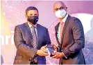  ?? ?? SohanthaWi­jesingha – Senior Vice President / Head of Corporate Banking, DFCC Bank PLC (Right) receiving the memento from Fadhil Jiffry, FCMA, CGMA – Chair of CIMA Sri Lanka country network committee (Left)