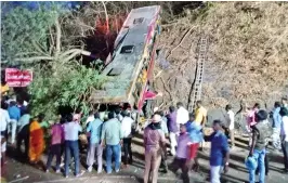  ?? ?? Rescue personnel and public at the accident site in Yercaud, on Tuesday