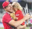  ?? ?? Jos Buttler celebrates with his daughter. Picture: Getty