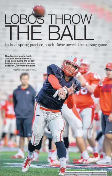  ?? ROBERTO E. ROSALES/JOURNAL ?? New Mexico quarterbac­k JaJuan Lawson throws a deep pass during the Lobos’ final spring practice session Friday at University Stadium.