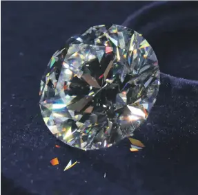  ??  ?? A lab-grown diamond, above, is scientific­ally identical to natural diamonds, right and far right, but far less expensive