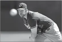  ?? CARLOS OSORIO/AP PHOTO ?? Clayton Kershaw of the Dodgers throws before Friday’s spring training game against the White Sox at Glendale, Ariz.