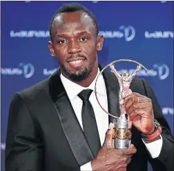  ?? PHOTO: EAMONN MCCORMACK/GETTY IMAGES ?? Usian Bolt poses with his Laureus Sportsman of the Year award.