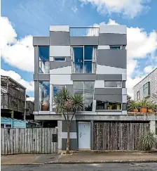  ?? PHOTOS: TALL POPPIES ?? Described by one designer as ‘‘Mondrian after a few too many martinis’’, this stunning house in Aro Valley is on sale for the first time.