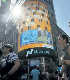  ?? GETTY IMAGES FILES ?? Above: The Nasdaq prompter is seen in New York City. Nasdaq Canada and its parent company Ensoleille­ment Inc. have applied for recognitio­n as exchanges in Canada.