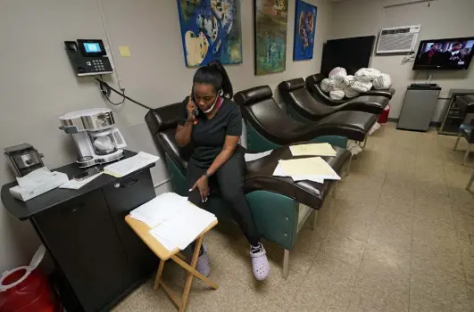  ?? ?? An employee talks on the phone in a recovery room inside the Hope Medical Group for Women last month in Shreveport, La. Legal challenges, including from the Supreme Court, hover over those who run America’s abortion clinics.