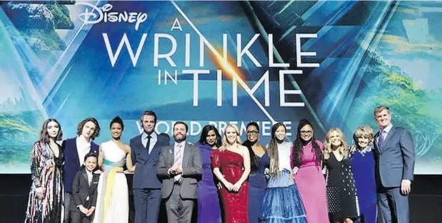  ?? COURTESY OF CATHERINE HAND ?? Catherine Hand, second from right, is all smiles at the première for A Wrinkle in Time last week in Hollywood.