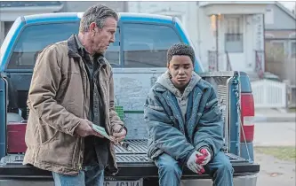  ?? ALAN MARKFIELD LIONSGATE ?? Dennis Quaid, left, and Myles Truitt in "Kin." Quaid plays a tough dad to his adopted son.