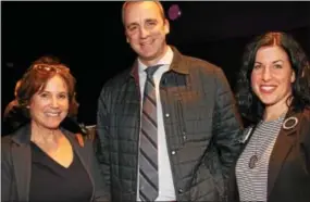  ??  ?? Bryn Mawr Hospital’s president Andrea Gilbert, behavioral health director and DMAX board member Michael Hammonds and Liz Bland, director of BMH’s Emotional Wellness Center, head to the auditorium for the opening ceremonies.